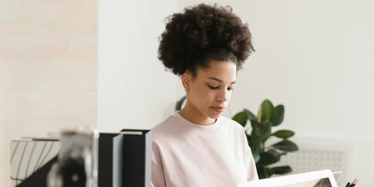 A woman working in an office.