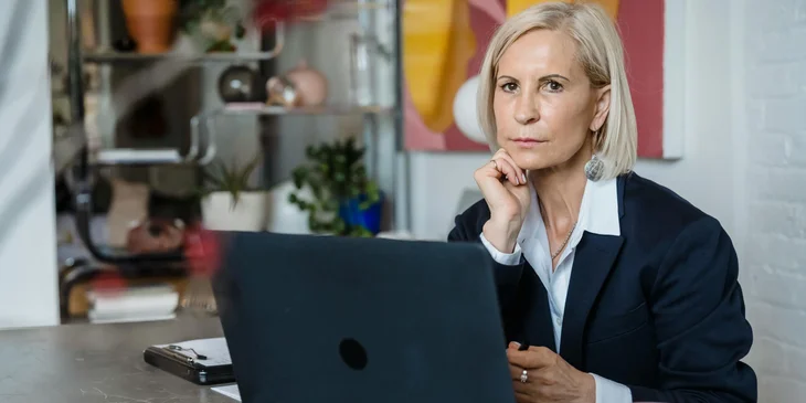 A business woman working on her laptop.
