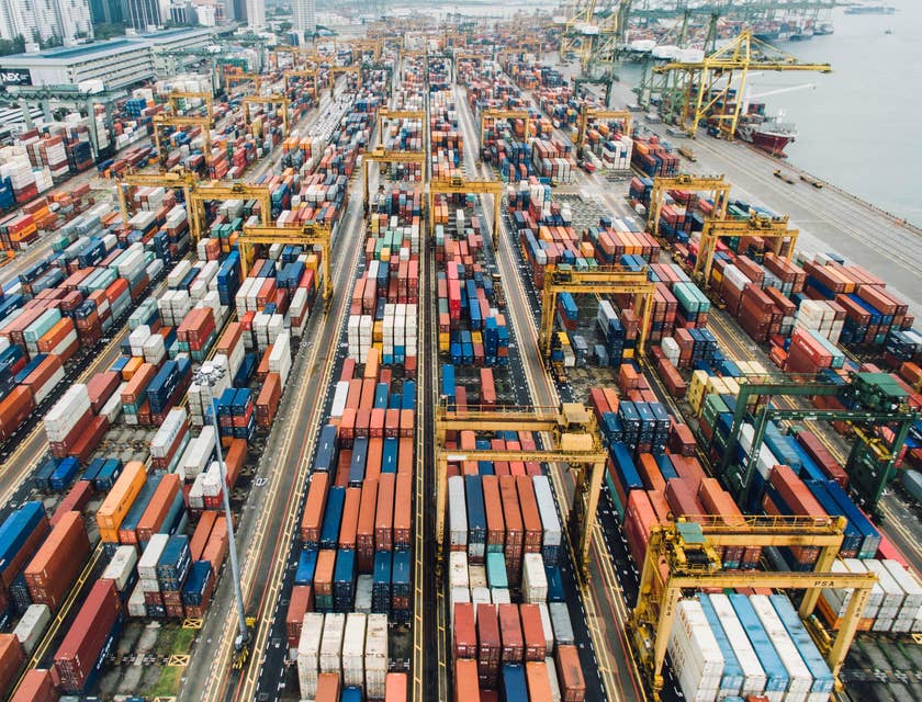 Shipping yard filled with shipping containers for logistics purposes.