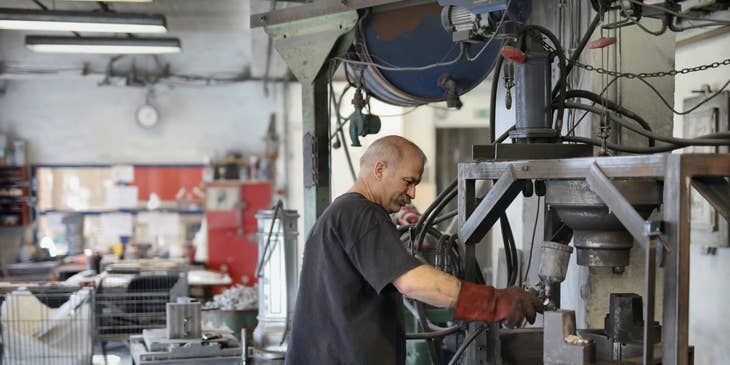Machine operator using heavy machinery.