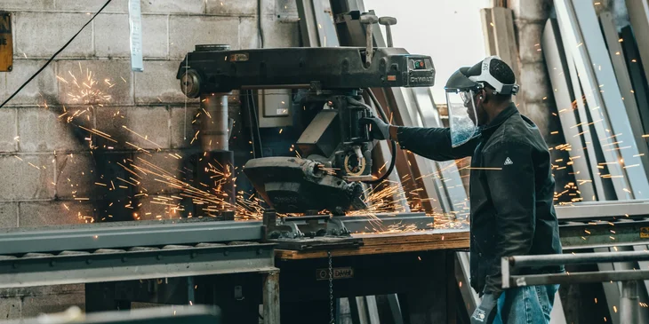 A man working on tools.