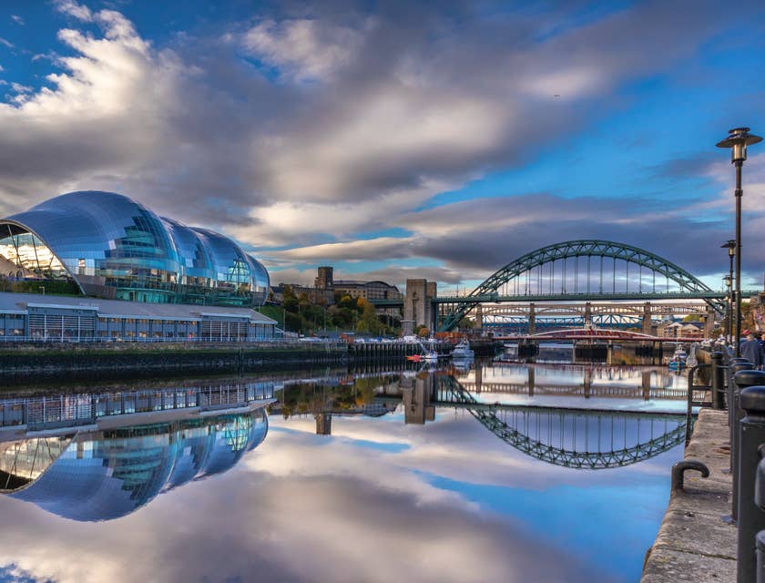 A waterside view of Sage Gateshead & Tyne Bridge in Newcastle upon Tyne.