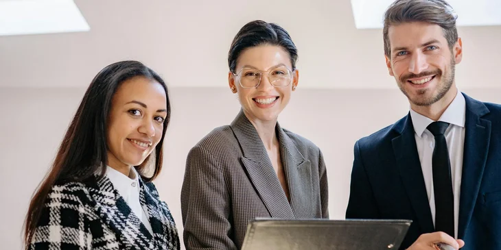 The office workers wearing coats.