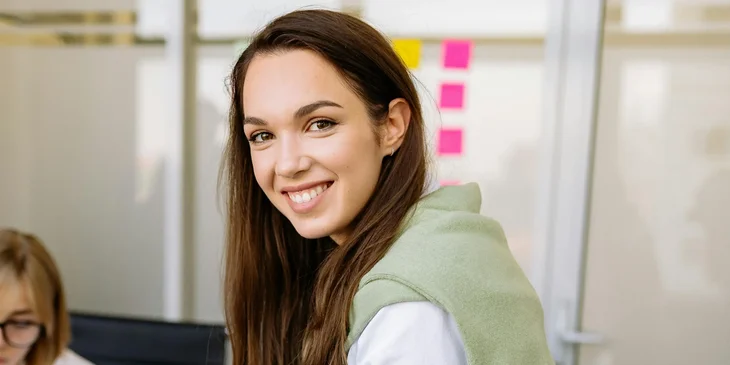 A woman in an office.