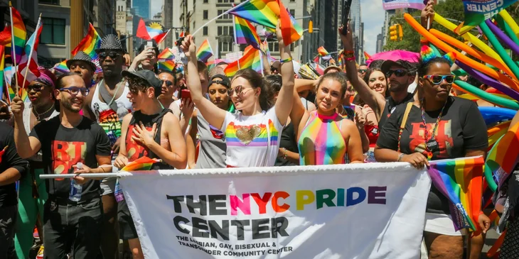 A group of people in a pride parade.