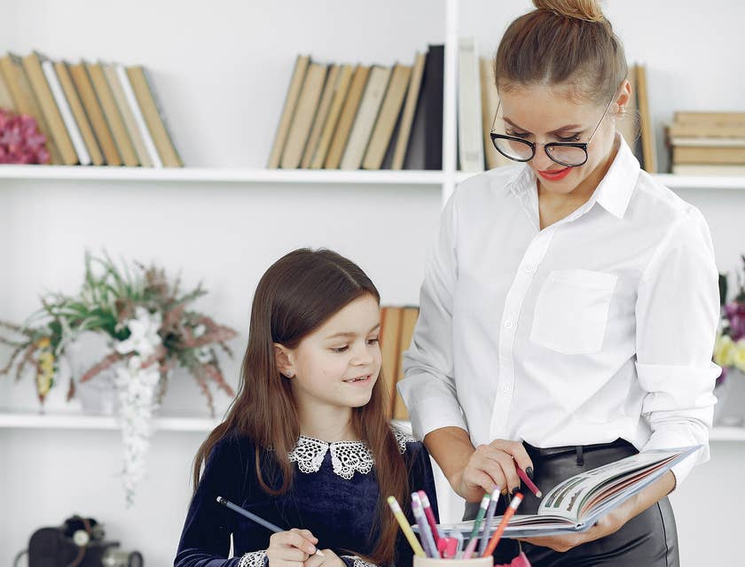 paraprofessional working with a student