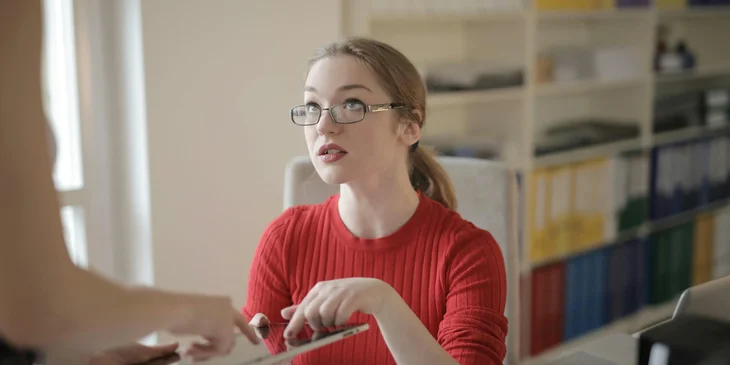 A payroll administrator receives the payroll documents.