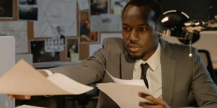 A payroll assistant doing some paperwork.