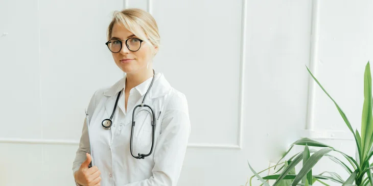 A physician poses for the camera.
