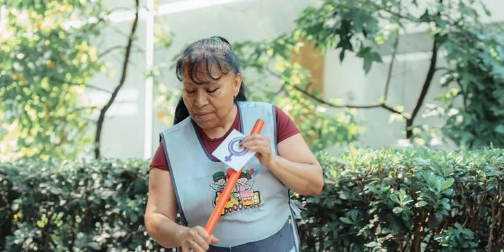 A woman working outdoors.