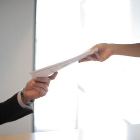 Prepare a stack of resumes to give to recruiters.