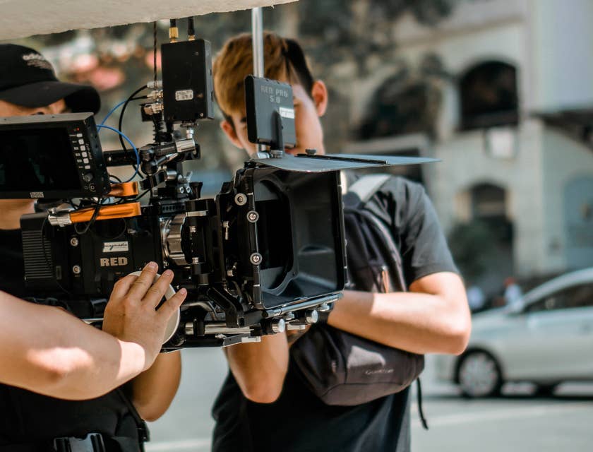 production assistant helping the director