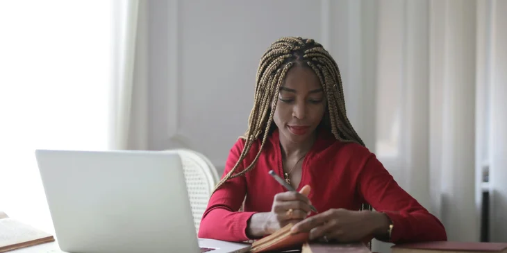 An editor reviewing the content of the book before publication.