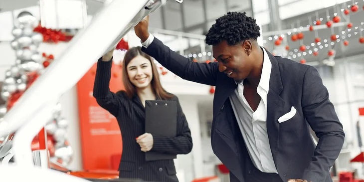 A sales representative assisting a customer.