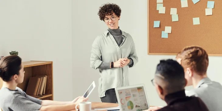 A sales team holding a meeting to boost sales.