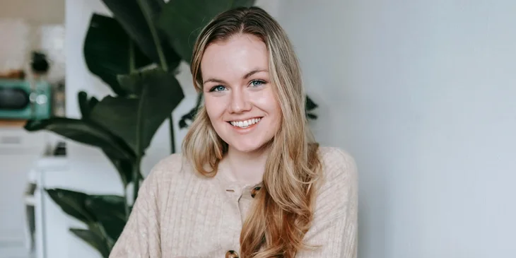 A cheerful student smiling.