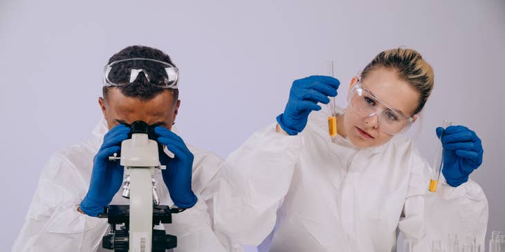 Two scientists working in a laboratory.