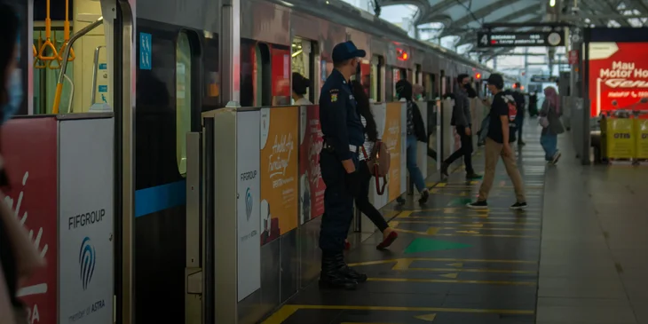 A security guard working at the train station.