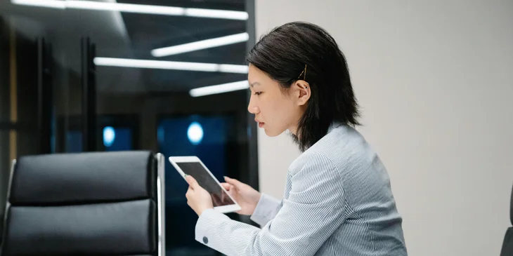 A senior business analyst reviewing current performance data.