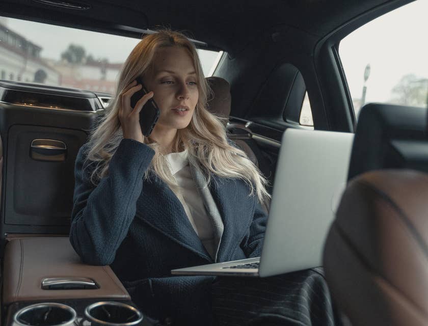 Senior vice president sitting in a car