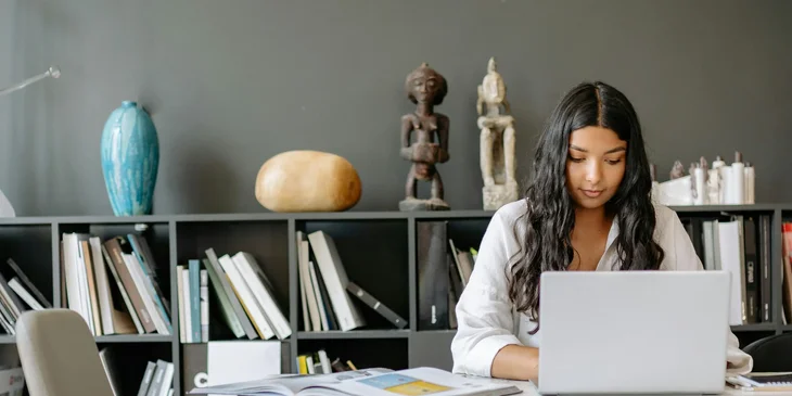 A woman working in an office.