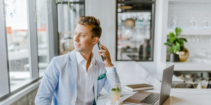 A man talking on the phone.