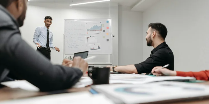 A strategy manager discussing ways to increase sales and productivity.