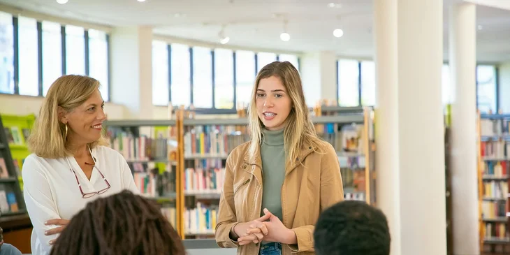 A student assistant introducing herself to the students.