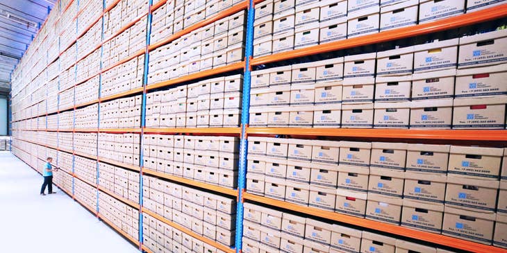 supply chain analyst inspecting a warehouse