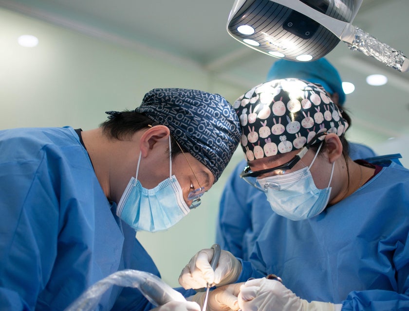 surgical technologist performing an operation
