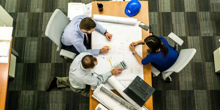Coworkers discussing a new project.