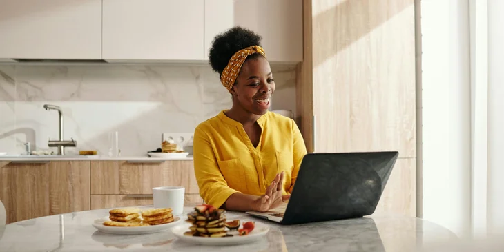 A woman reading the email after sending her application.