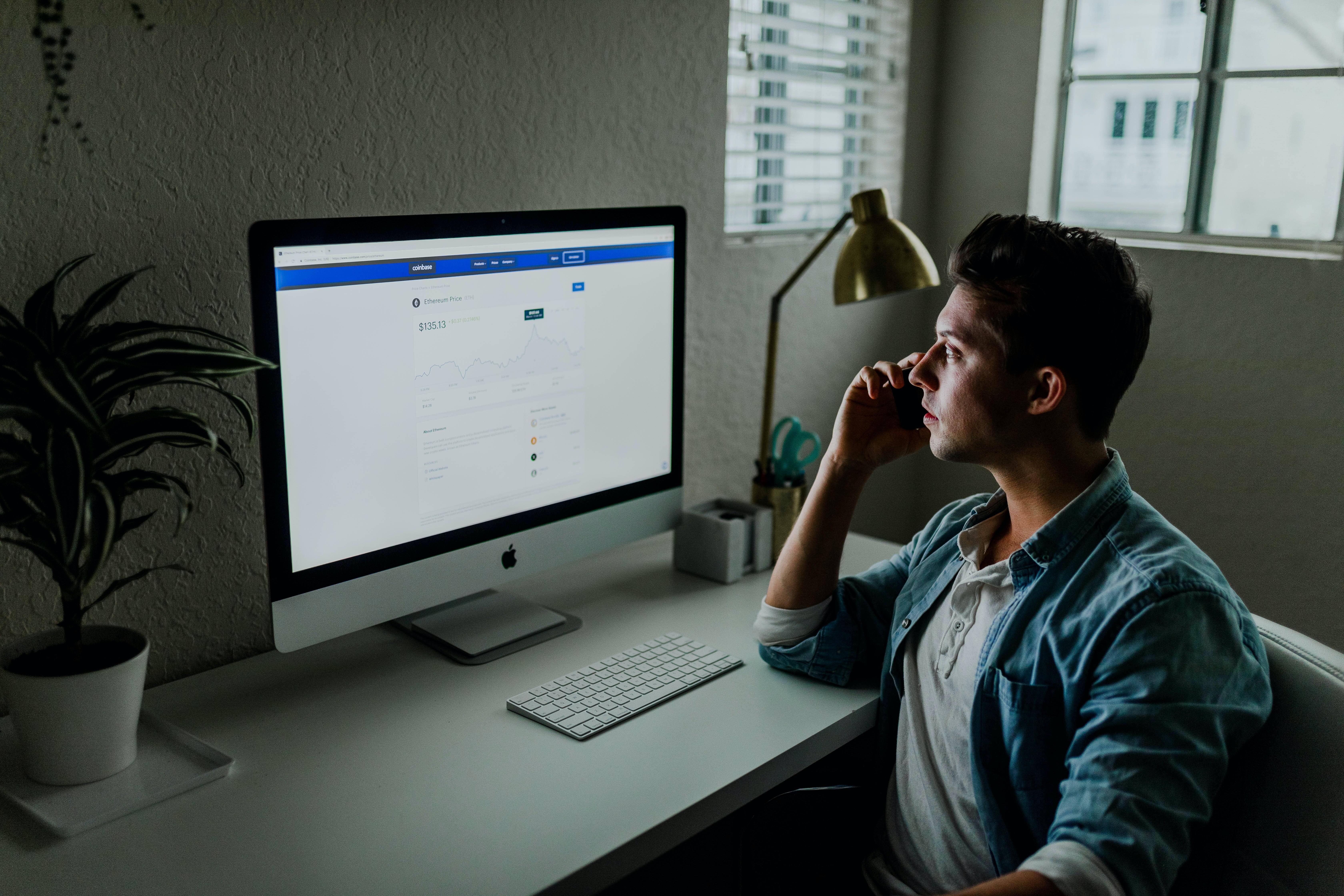 man reading a thank you for applying email