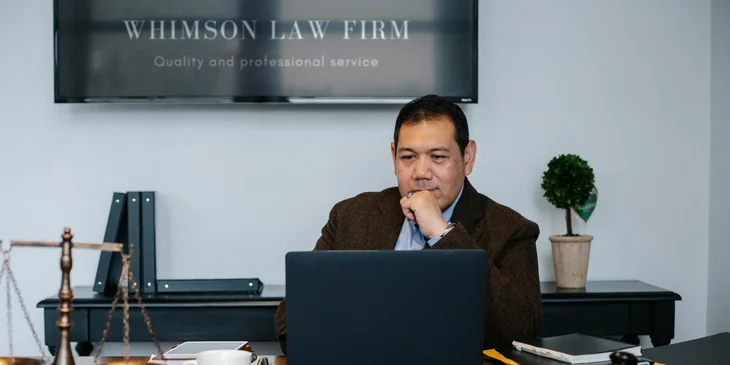 A lawyer working at his desk.