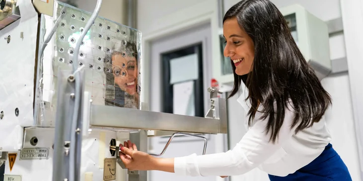 A female engineer checking an equipment.