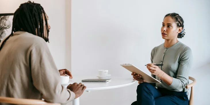 An interviewer and an interviewee during one of the stages of a Topgrading interview.