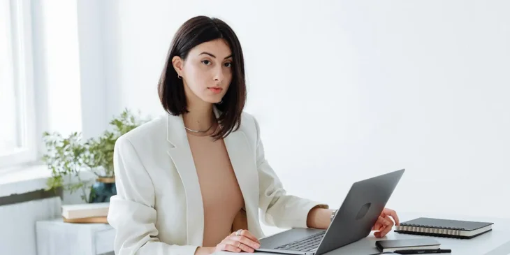 A woman in a white office.