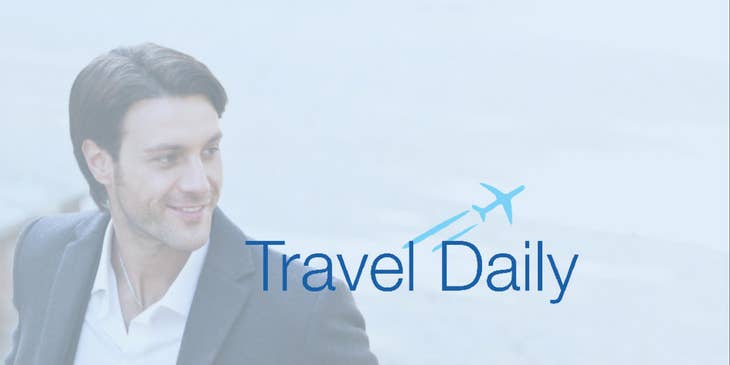 Traveldaily logo.