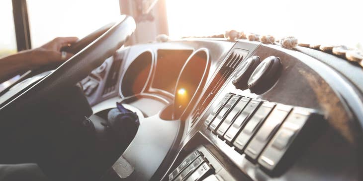 truck driver holding steering wheel