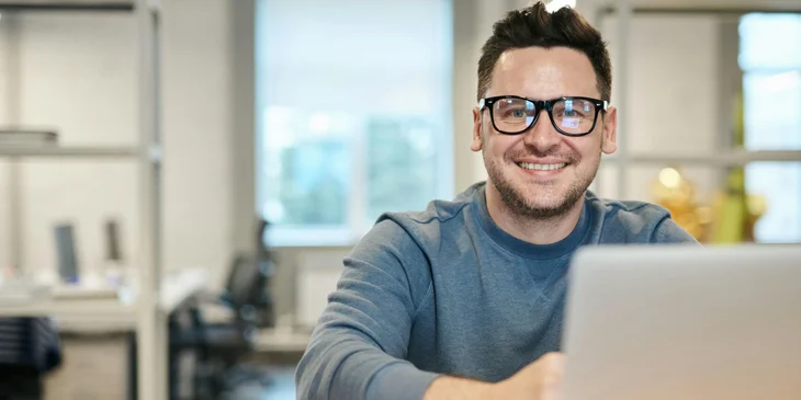 A man wearing glasses.