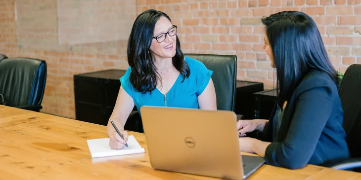 A corporate advisor consulting with a client.