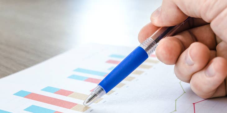 A financial manager reviewing a financial report.