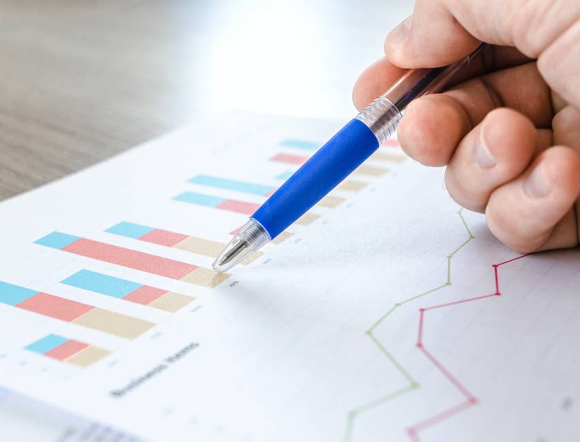 A financial manager reviewing a financial report.