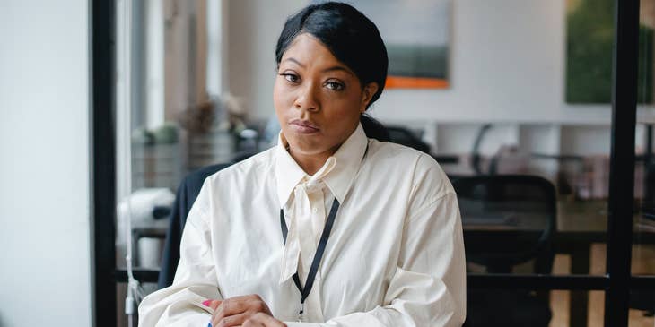 A woman in a white-collar job.