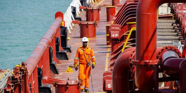 A maritime professional working on an oil rig.