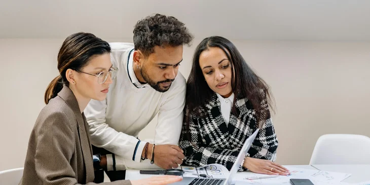Coworkers working together on a project.