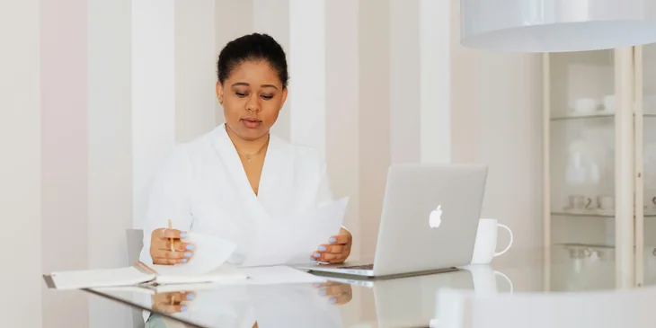 A woman working at her office.