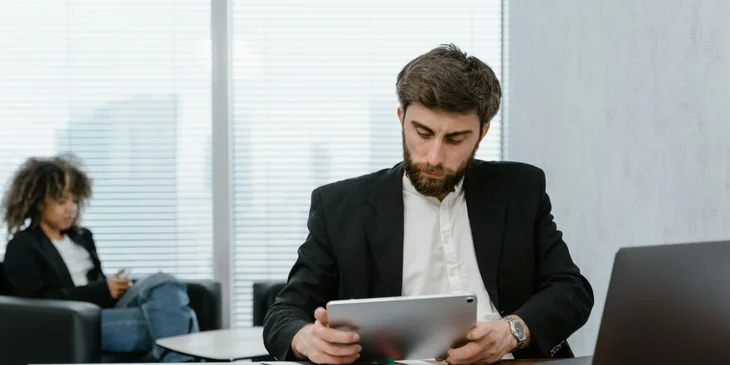 A man working at his desk.