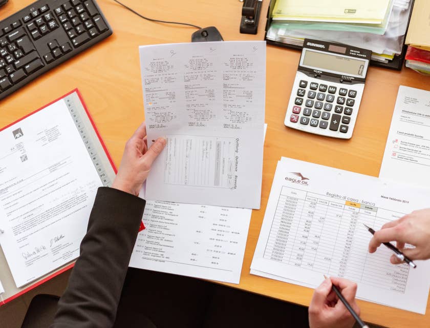 The billing specialist takes note of the payments made.