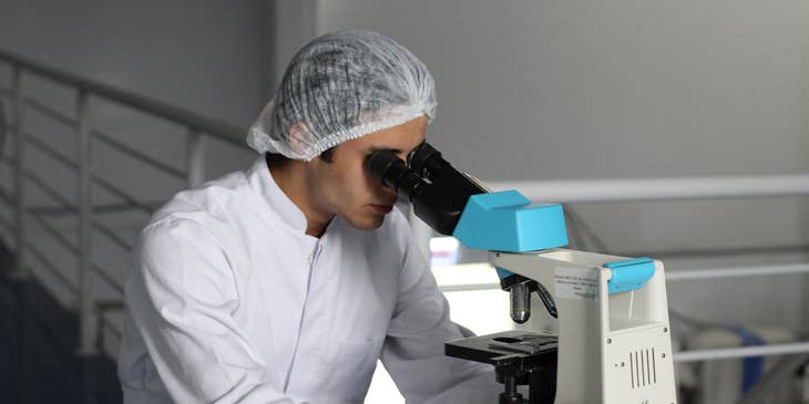 Biochemist studying the chemical process of a living organism's cell